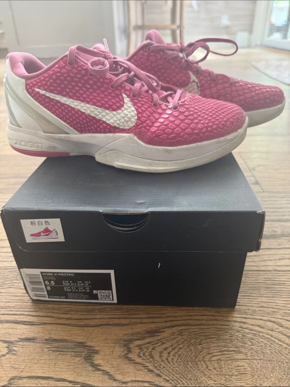 Nike Pink Low-Top Basketball Sneakers with White Swoosh